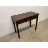 A Victorian mahogany folding tea table with small central drawer. W:85cm x D:43cm x H:74cm