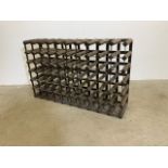 A wine rack form sixty bottles.W:100cm x D:24cm x H:62cm