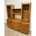 Ercol blonde display unit, two glazed cupboards with adjoining shelf above sideboard.W:156cm x D: