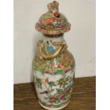 A late 19th early 20th century famille rose Cantonese lidded vase.W:6.5cm x D:6.5cm x H:15.5cm