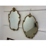 A near pair of ornate modern gilt Rococo style mirrors.W:58cm x D:cm x H:88cm