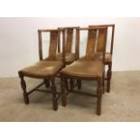 Set of four oak dining chairs with upholstered seats.W:45cm x D:40cm x H:85cm