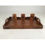 A mahogany tray with three bamboo pots