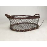 A vintage chicken wire basket