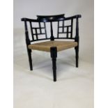 An ebonised rush seated chair. Attributed to Godwin for William WattW:56cm x D:53cm x H:58cm