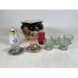 A collection of ceramic and glass items to include small cranberry glass jug, four ice cream dishes,