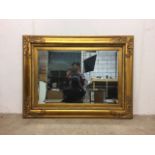 A large gilt framed mirror. W:122cm x D:cm x H:92cm