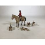 A collection of Forest Toys by Francis Herbert Whittington. A horse with rider and four beagle