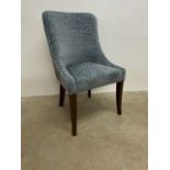 An upholstered desk chair. W:54cm x D:64cm x H:93cm