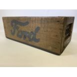 A vintage mechanics pine box with Ford lettering to both sides and metal handles