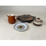 A mixed collection of ceramics and Poole Pottery placemats. To include milk jug by Honiton