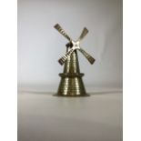 A Dutch cast brass hand bell in the form of a windmill.