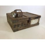 A Devon county library storage crate with vintage torch.
