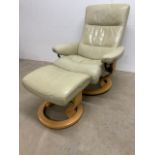 A cream leather stressless chair and footstool. W:76cm x D:80cm x H:95cm