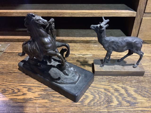 A bronze model of a stag on a wooden plinth base together with a small bronze Marley horse on bronze