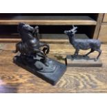 A bronze model of a stag on a wooden plinth base together with a small bronze Marley horse on bronze
