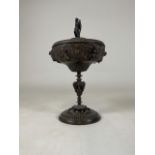 A 19th Century Italian grand tour bronze lidded urn chalice having a winged angel finial lid with