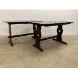 A pair of pub tables.W:114cm x D:76cm x H:72cm