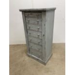 A vintage painted pine Wellington chest with key.W:53cm x D:37cm x H:104cm