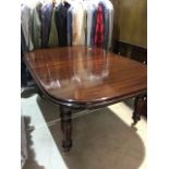 A mahogany reproduction extending dining table. W:177cm x D:120cm x H:75cm. Extends to:W:273cm x