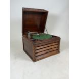 A oak cased record player with crank system