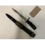 A British No7 MK1 knife bayonet, single edged, clipped point blade with fuller together with