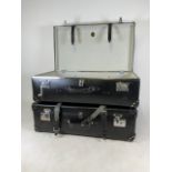 A pair of Globe Trotter large leather suitcase with leather straps, wheels and stamped locking