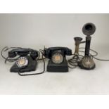 Three retro telephones with spin dials
