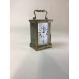 A French gilt brass carriage clock. Movement stamped made in France, H:11cm