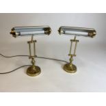 A pair of early 20th century brass library desk lamps.W:30cm x D:cm x H:45cm