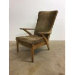 A Parker Knoll mid century arm chair stamped model no P.K. 900/6. W:62cm x D:80cm x H:92cm