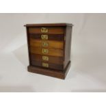 A six drawer mahogany collector's cabinet. W:31cm x D:24cm x H:39cm