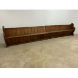 Two pine half church pews. A near pair.W:403cm x D:51cm x H:82cm