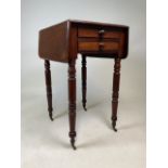 Small mahogany Pembroke table with two drawers,turned legs and small brass castors. W:40cm x D: