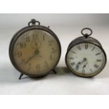 An Ingersoll Revally alarm clock and smaller brass alarm clock with bevelled glass front and key.
