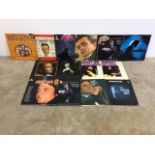 A selection of fourteen LPs of Johnny Cash. To include Cash at Folsom Prison, Tribute to Cash by