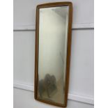 A mid century mirror with a bevelled edge. W:36cm x H:96cm