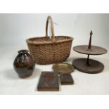 A wicker basket, wooden cake stand , pottery vase etc.
