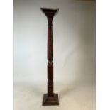 A Victorian mahogany square based torchiere with turned and carved column. W:25.5cm x D:25.5cm x H: