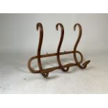 A bentwood wall mounted coat hook.