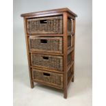 A four drawer wicker storage unit. W:55cm x D:45cm x H:96cm