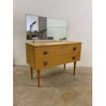 A mid century dressing chest. W:91cm x D:41cm x H:110cm