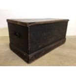 An Victorian pine box with metal handles. W:85cm x D:44cm x H:42cm