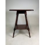 An early 20th century mahogany two tier occasional table with square top and turned legs. W:51cm x