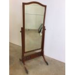 A large Edwardian inlaid shield shape cheval mirror. W:70cm x D:65cm x H:175cm