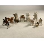 Four Beswick animals a Royal Doulton cat and three others.