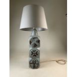 A Troika style moulded ceramic lamp. W:13cm x D:13cm x H:48cm