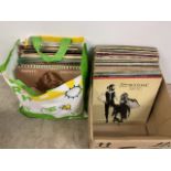A large collection of pop, rock, classical and country LPs. To include Please Please Me by The