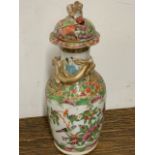 A late 19th early 20th century famille rose Cantonese lidded vase. W:6.5cm x D:6.5cm x H:15.5cm