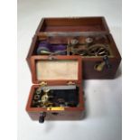 A late 19th early 20th century mahogany cased patent magneto- electric therapy machine together with